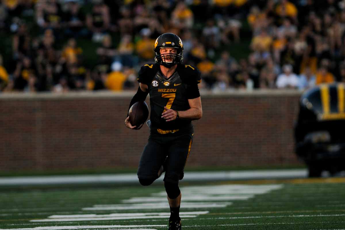 Quarterback Maty Mauk runs for a gain in the third quarter. His 36-yard rush in the third quarter to set up a touchdown was the longest run of his career. 