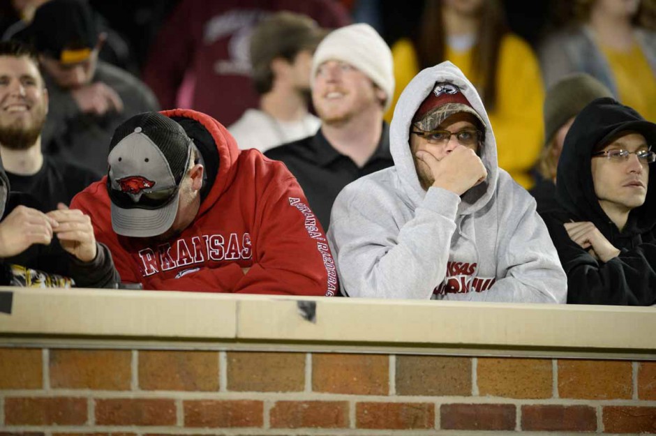Dejected Arkansas fans