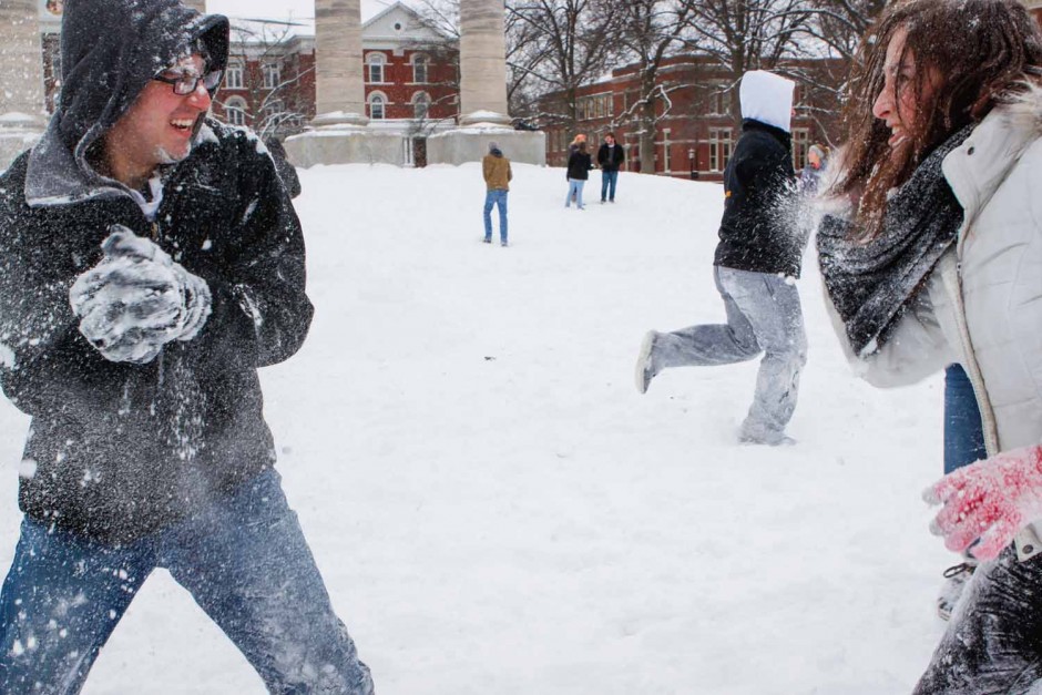 Jared Kaufman prepares to throw another snowball at Rachel Foster-Gimbel. The opposing team members didn't seem to mind a face full of snow. Photo by Tanzi Propst. 