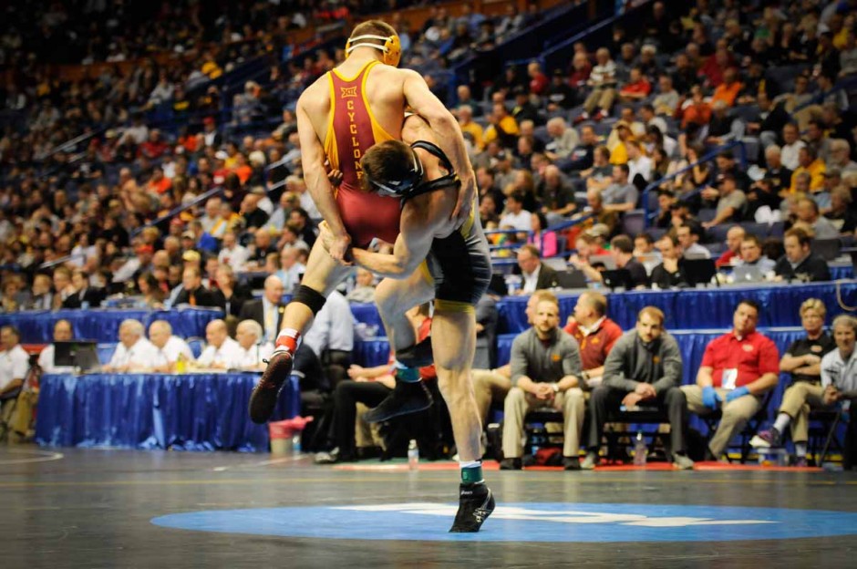 Senior Johnny Eblan takes Iowa State's Tanner Weatherman to the mat on his way to a 8-0 major decision win in the 174-pound weight class.