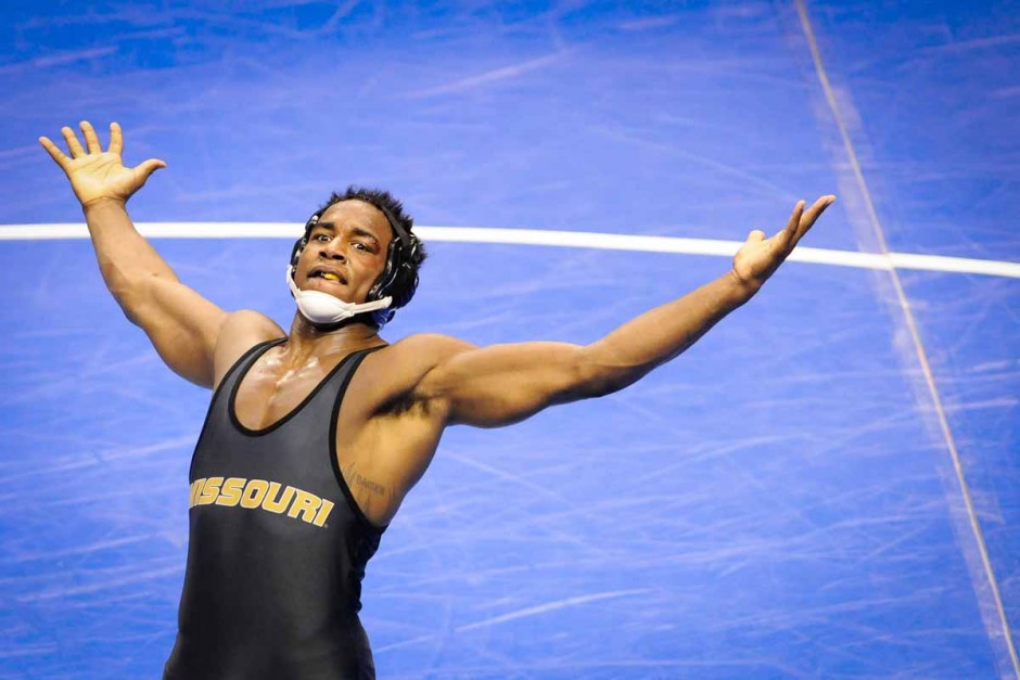 Returning national champion J'Den Cox celebrates a 3-2 victory on Friday morning against Michigan's Max Huntley in the 197-pound division.