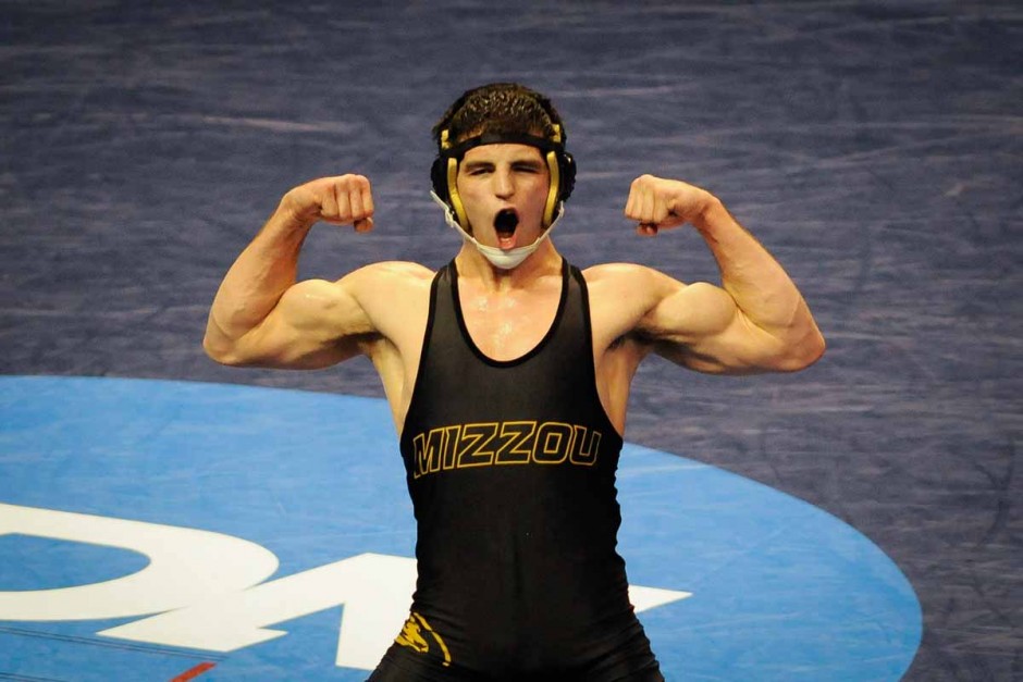 Willie Miklus faces Mizzou fans and celebrates a 6-5 victory against Nebraska's Timothy Dudley for seventh place and All-American recognition in the 184 pound weight class.