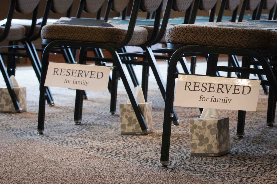 Boxes of tissues were placed under chairs reserved for family members in the front rows of Stotler Lounge.