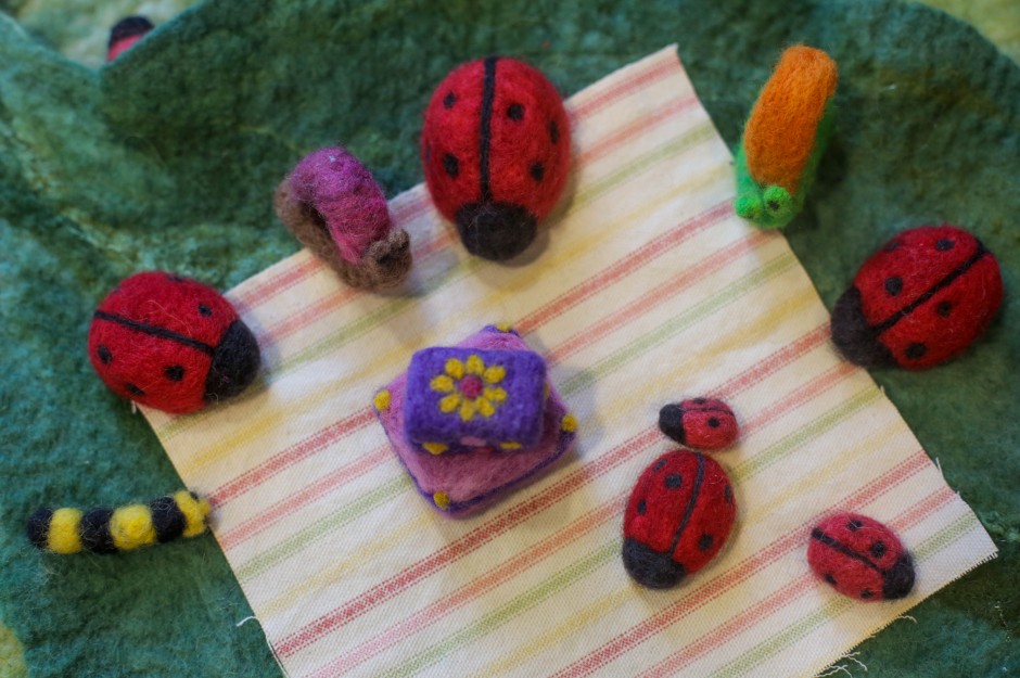 Felted play sets made by Kate Akers from MU Extension sit on display at the 2015 Mu Arts and Crafts Showcase. Each playset is made up of a collection of small, handmade pieces.