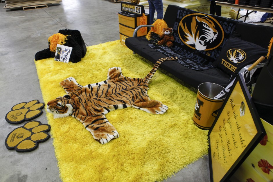 A mock living room arangement, themed Mizzou, is set up and hoped to be sold at the Tiger Treasures' Rummage Sale on Saturday, May 30, 2015. The arrangement includes wall decorations, a rug, a futon, pillows, a blanket and more.