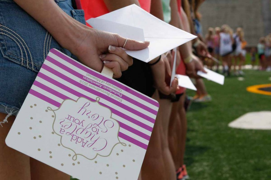 McKenna Alexander holds her bid day card, waiting patiently to open it and see which chapter is waiting to welcome her Sunday morning on Faurot field. Pi Chi leadership counted down from 10 to the reveal.