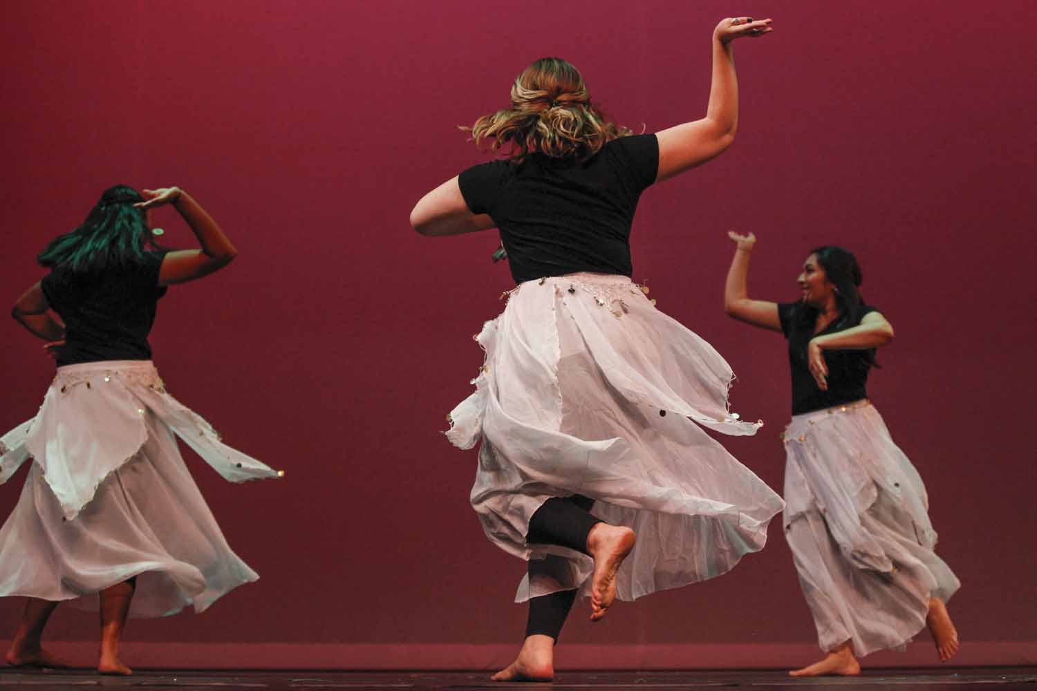 Members of Mizzou Masti dance to "Chaiyya Chaiyya" during the second act of India Nite at Jesse Hall.