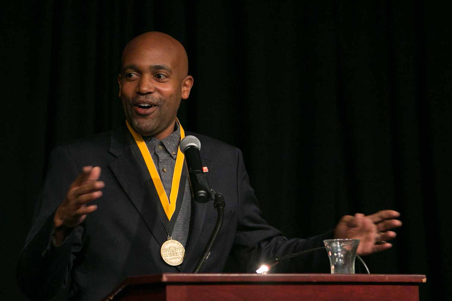 Entrepreneur and activist Lincoln Stephens, BJ '03, delivers his acceptance speech after receiving an honor medal. In November 2008, Stephens decided to quit his job as an advertising account management executive to pursue his passion for mentorship and co-founded a nonprofit organization called The Marcus Graham Project. The organization, which is focused on bringing more diversity to the advertising industry through mentorship, exposure and career development, has been featured in Advertising Age, Black Enterprise magazine, Savoy magazine, and on CNN and NBC. Additionally, Stephens was named one of Advertising Age’s “40 under 40″ marketing leaders in 2013 and previously was featured in Ebony magazine as one of the top entrepreneurs in the country under the age of 34.