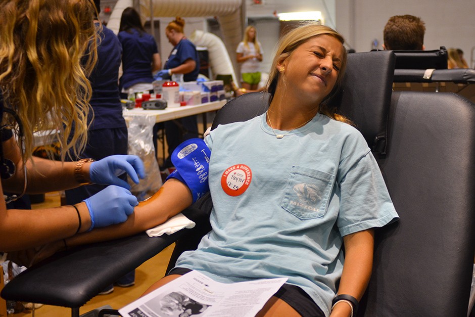 A student donates blood