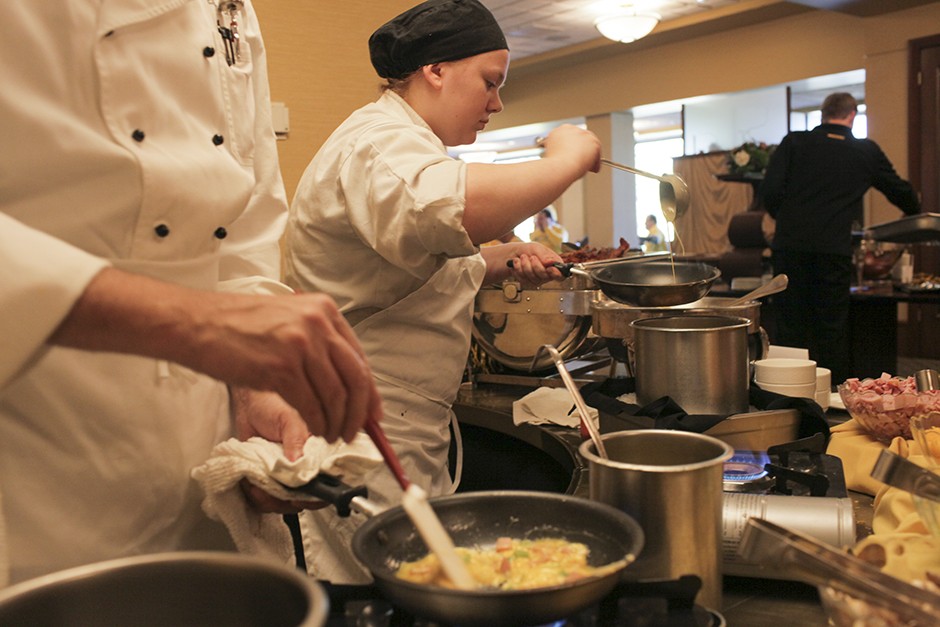 Chefs prepare omelettes at the University Club.