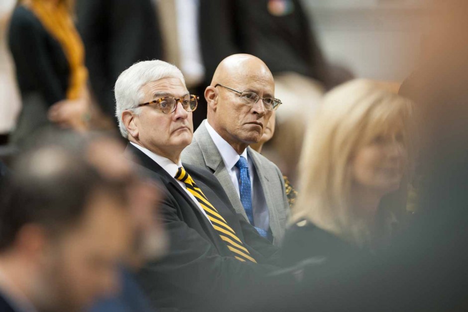 Interim chancellor Hank Foley and interim UM System President Mike Middleton sit in the crowd and listen to Coach Pinkel address questions from the press.
