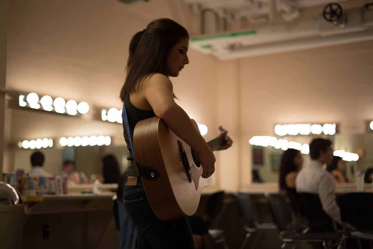 After moving on to the final round, Mizzou Idol contestant Breanna Lehane practices her second song of the night in the dressing room. Photo by Jake Hamilton.