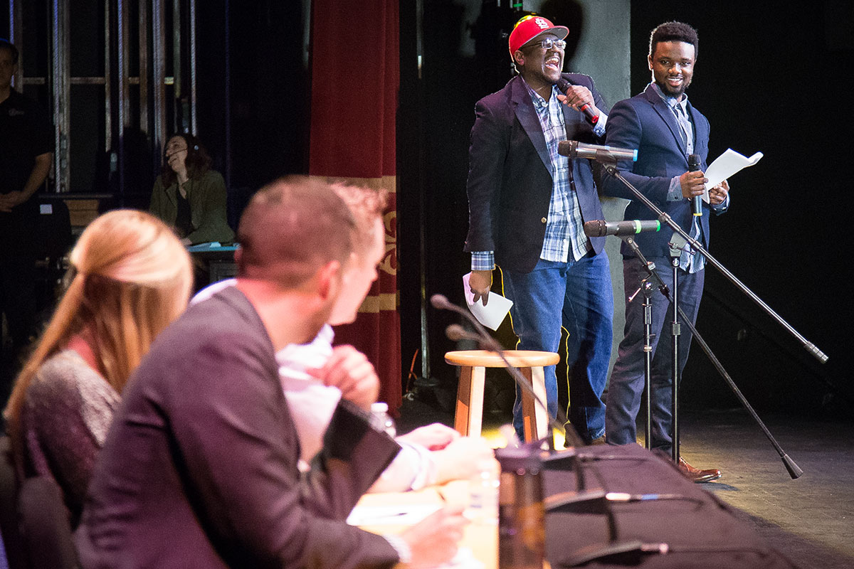 Emcees and judges joke onstage waiting for the next round of announcements for the show. Photo by Jake Hamilton.