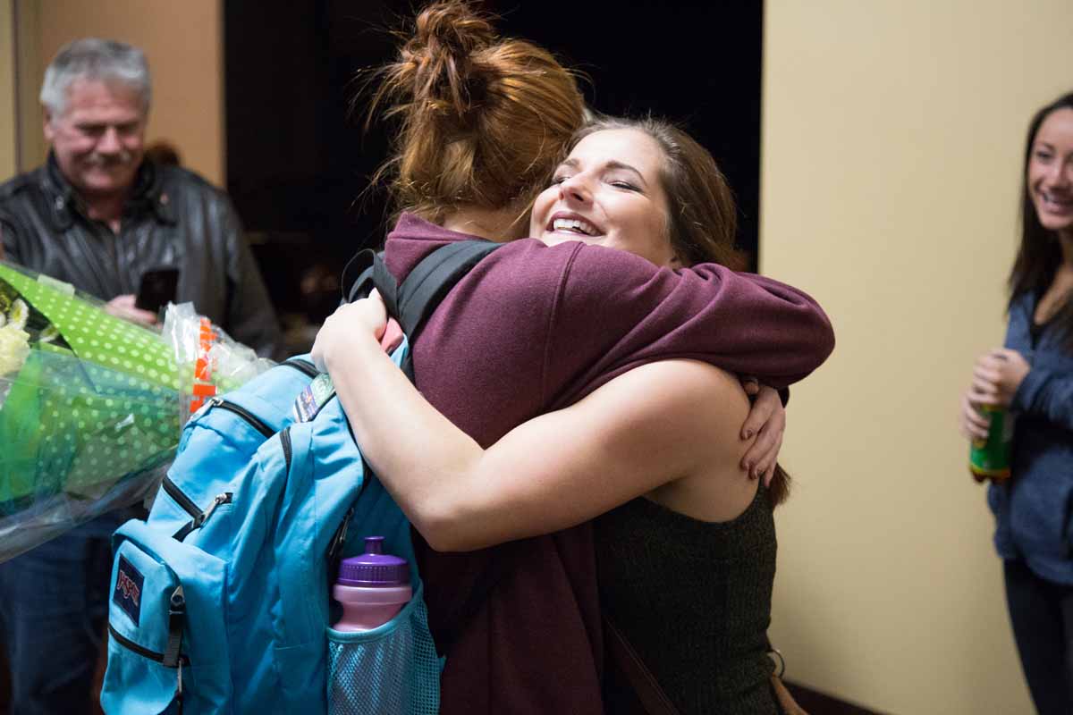 Mizzou Idol winner Breanna Lehane embraces friends and family after the conclusion of Mizzou Idol 2016. Photo by Jake Hamilton.