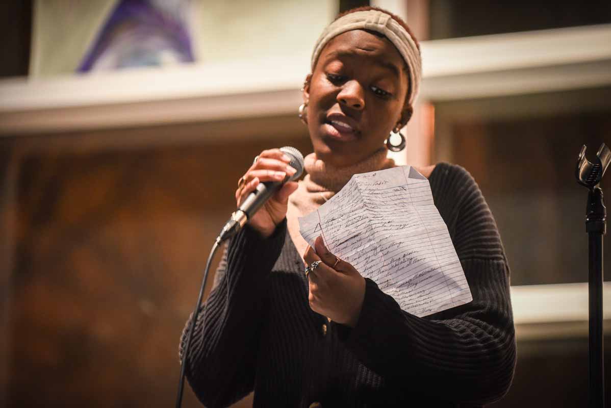Amuche Nwafor was the first performance of the night and recited a poem for a crowd of a few hundred students. Photo by Morgan Lieberman.