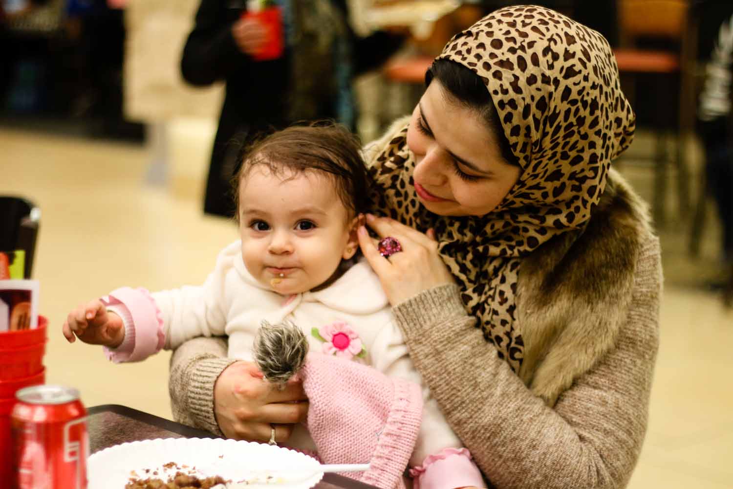 Parihan and Leila Zahra spend time with family and friends at the International Welcome Party. Photo by Hanna Yowell.