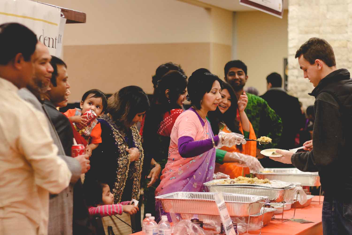 The Bangladesh Student Association shares traditional dishes with fellow MU students. Photo by Hanna Yowell.