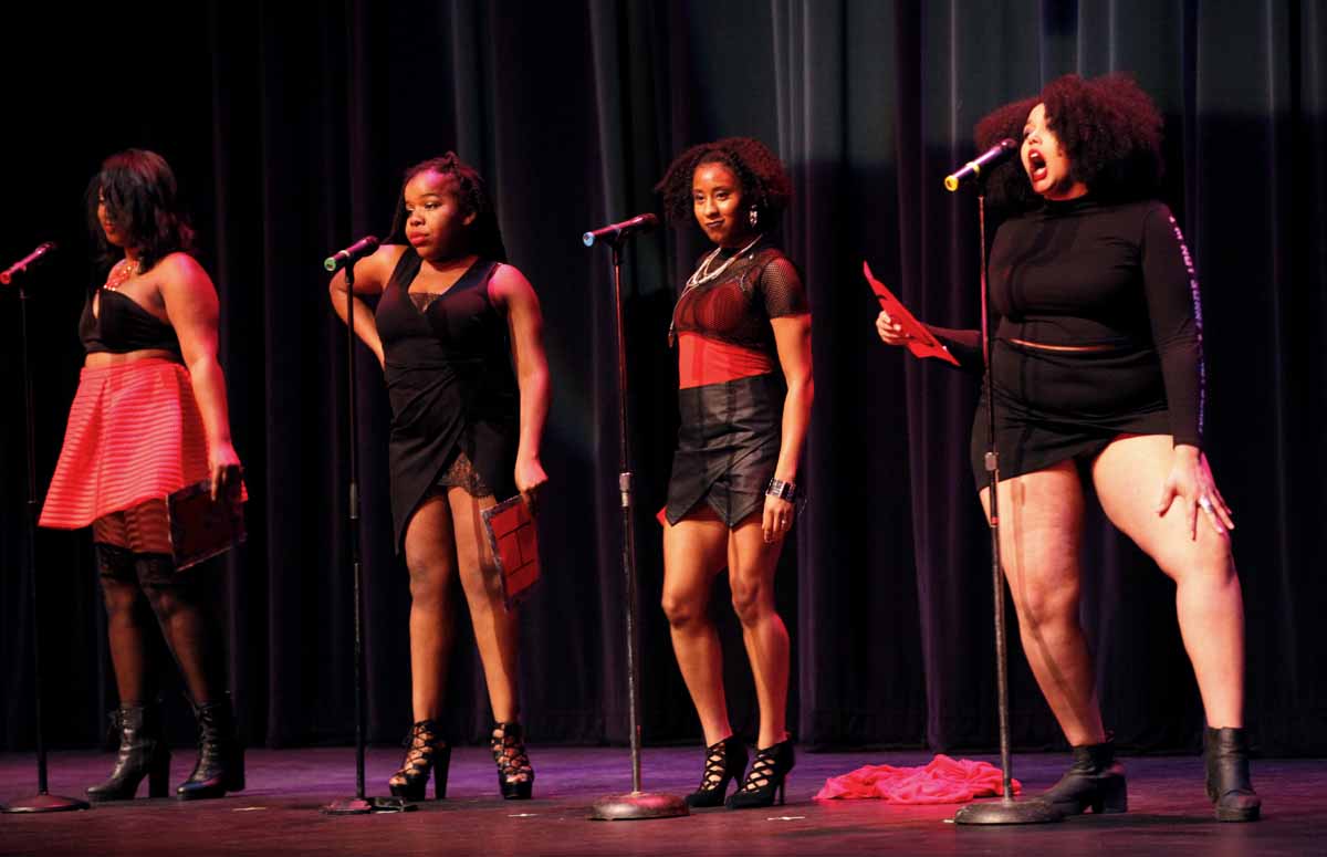From left, Eli'Jaah Muhammad, Jasmine Morgan, Alanna Diggs and Brianna Jackson perform the skit "My Short Skirt" during the Vagina Monologues Saturday evening, Feb. 27, 2016 in Jesse Auditorium.