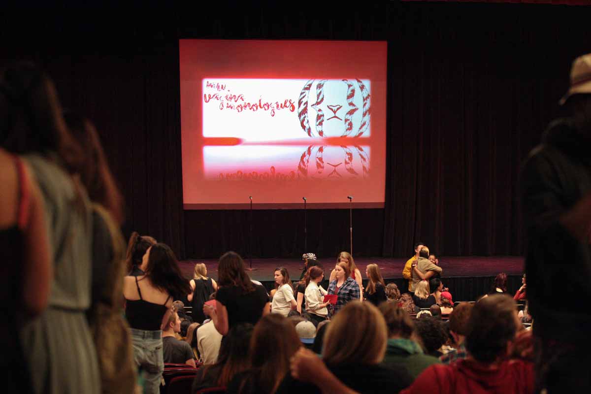 "MU Vagina Monologues" reads out on the on-stage projector in Jesse Auditorium during intermission of the performance Saturday evening, Feb. 27, 2016.