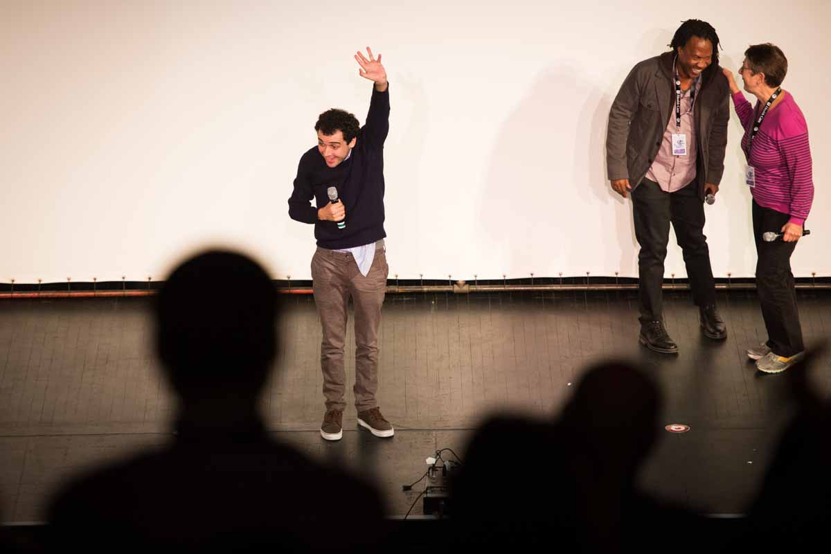 Special guest Owen Suskind, the main subject of 'Life, Animated,' waves to a standing crowd at the Missouri Theatre on Thursday night. Photo by Shane Epping.