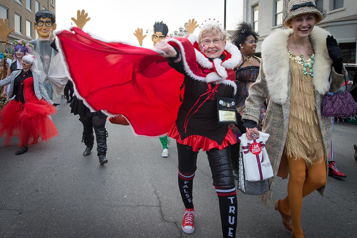 Carolyn Magnuson, queen of the Q, leads the March March Parade on Friday afternoon. Photo by Shane Epping.