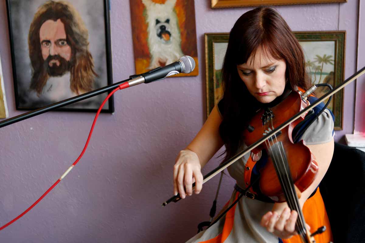 Molly Healey plays the violin during her song "Flight" at Sparky's Homemade Ice Cream Friday afternoon, March 4, 2016 during the True/False Film Festival's Sparky's Friday Showcase. Photo by Tanzi Propst.