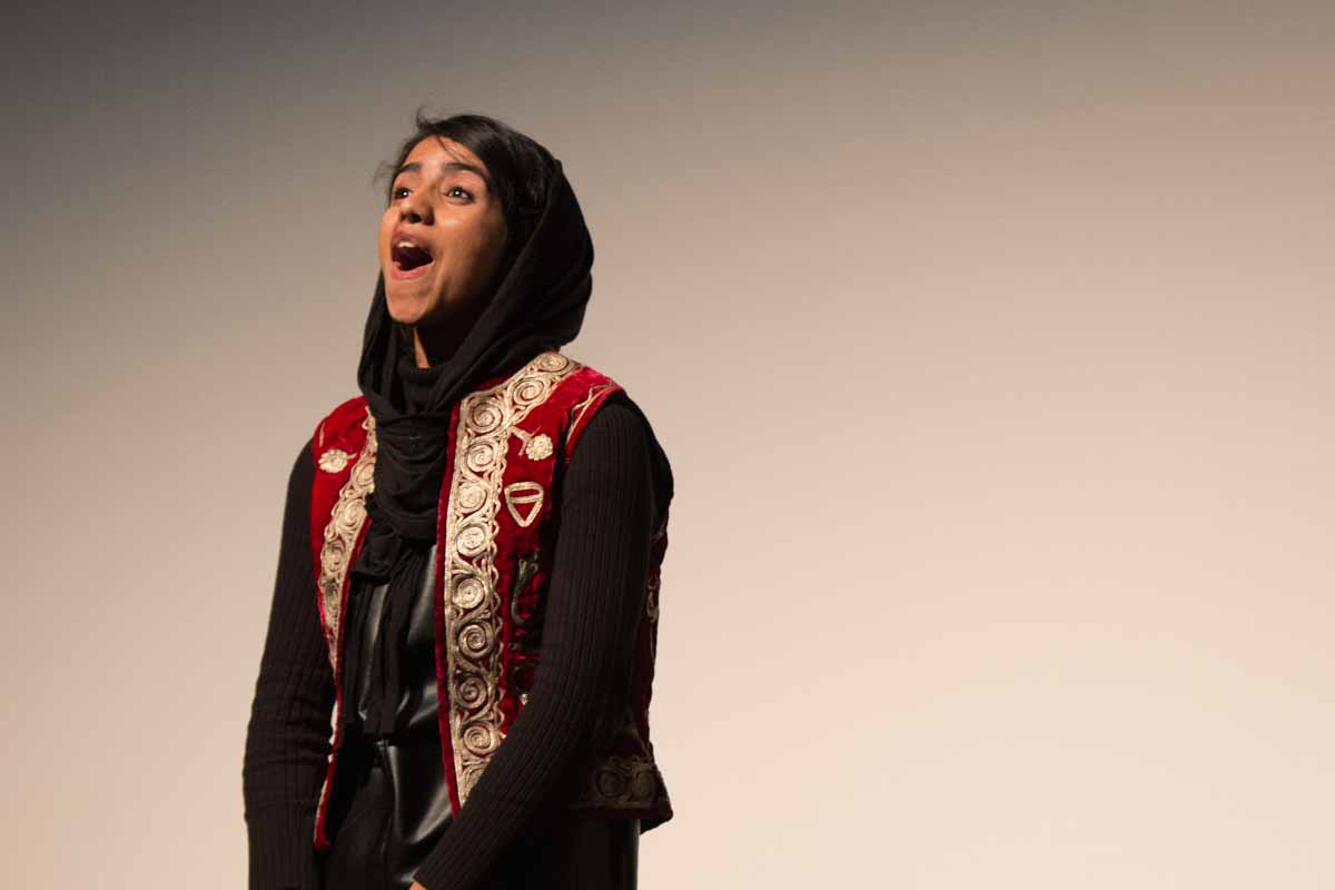 Sonita Alizadeh performs on stage at Jesse Hall and receives a standing ovation. Photo by Shane Epping.