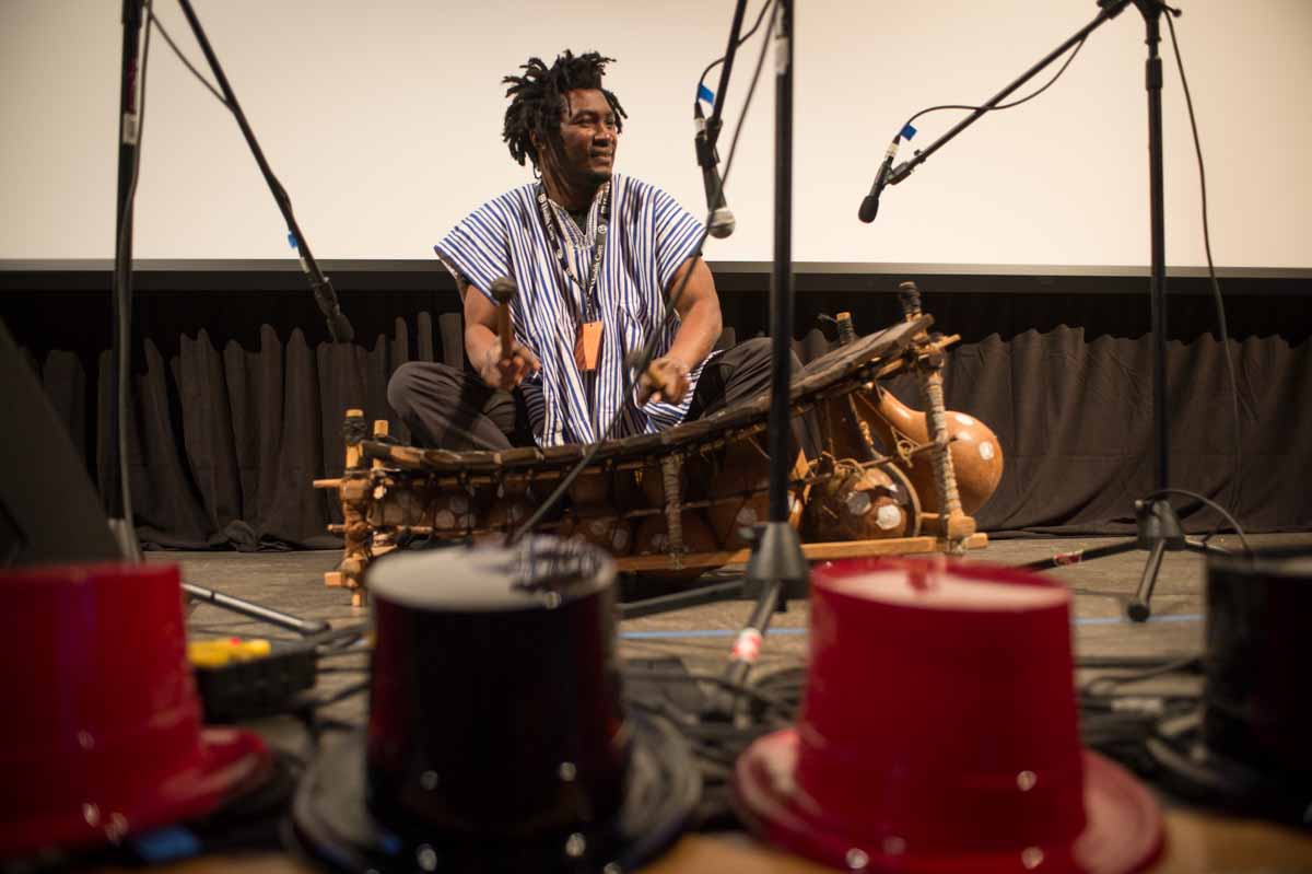 SK Kakraba performs at the Picturehouse. The Ghanaian gyil is an instrument made from dried gourds, the wood of rare fallen trees and the silk of spiders. A relative of the xylophone, it resonates with an eerie, soulful buzz that hums through generations. Photo by Shane Epping.