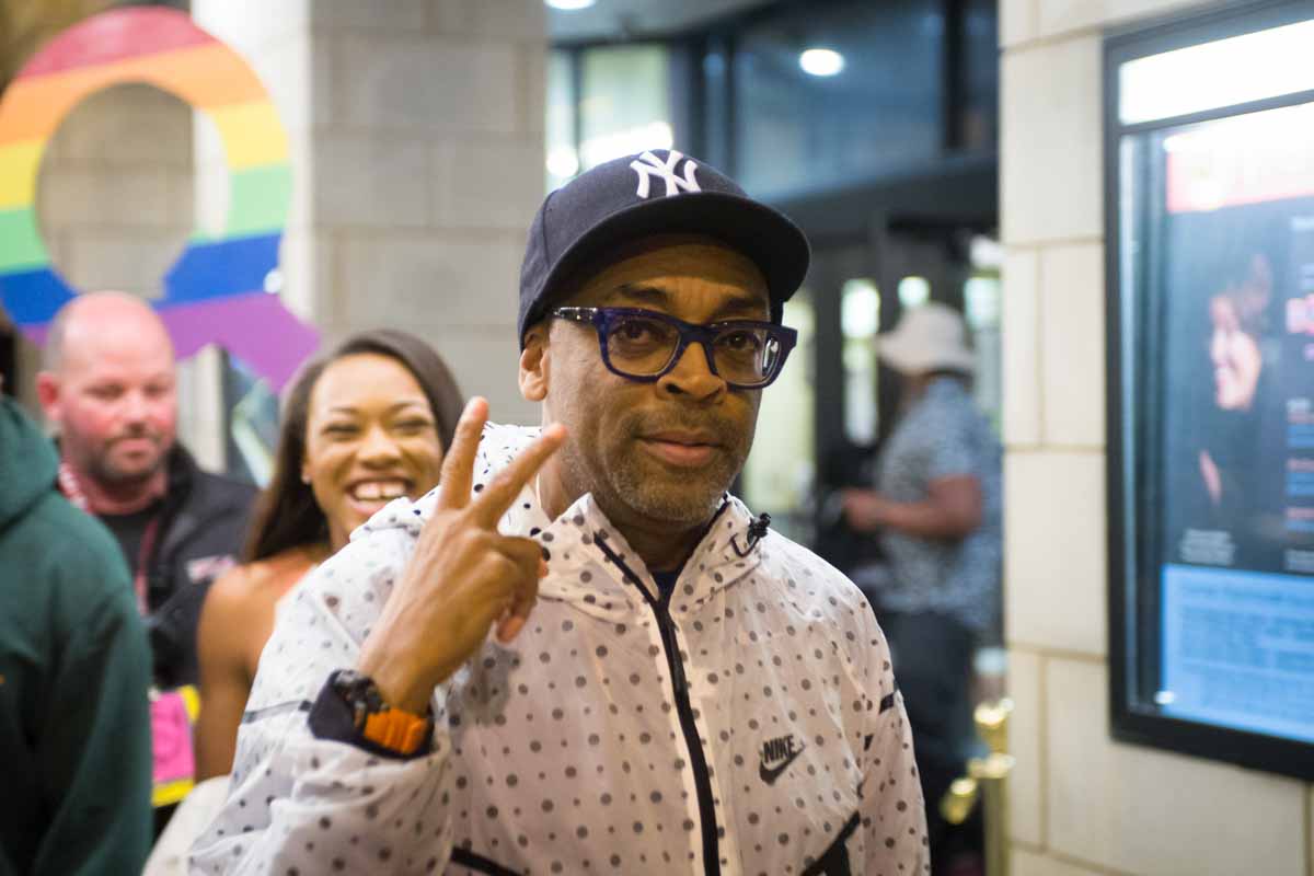 Spike Lee flashes a peace sign after exiting the Missouri Theatre where he watched Concerned Student 1950. This past fall, Concerned Student 1950, a collective of black student activists at Mizzou, rekindled a conversation about racism on campus. Photo by Shane Epping.