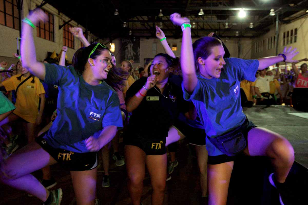 From left, Dylan Perrone, Katherine Fraley and Rachel Richardson Zumba it out in the front row during the main event.