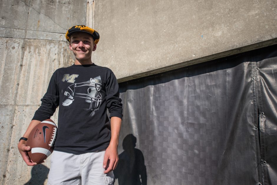 Brett Williams, 17, played some ball before the game outside of Faurot Field on Saturday.