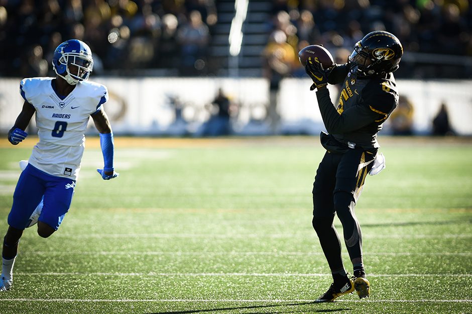 Wide receiver J’Mon Moore receives a 40-yard pass from Drew Lock in the second quarter. Photo by Shane Epping.