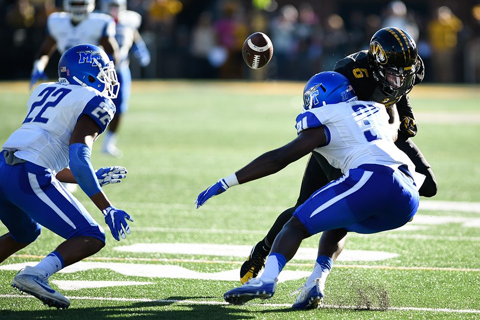 Wide receiver J’Mon Moore fumbles the ball on the 15-yard line, resulting in a Middle Tennessee State touchback. Photo by Shane Epping.