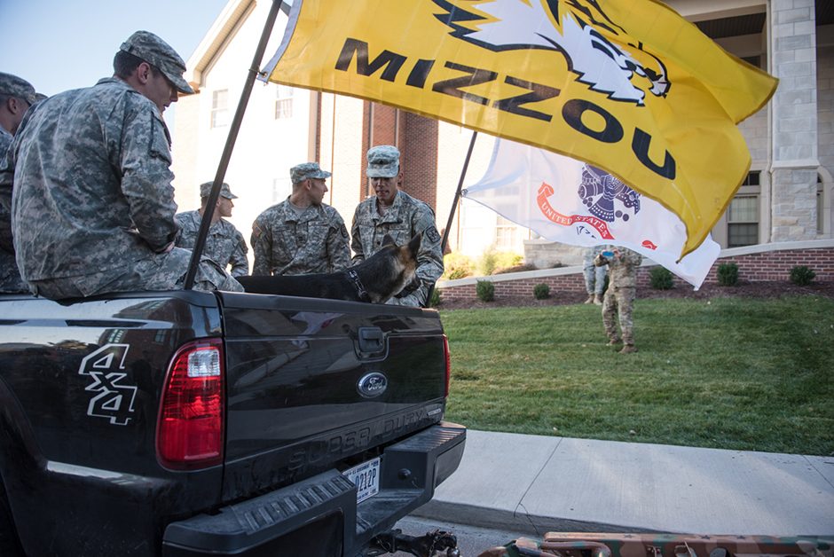 ROTC awaits Homecoming festivities in the back of a pickup truck. 