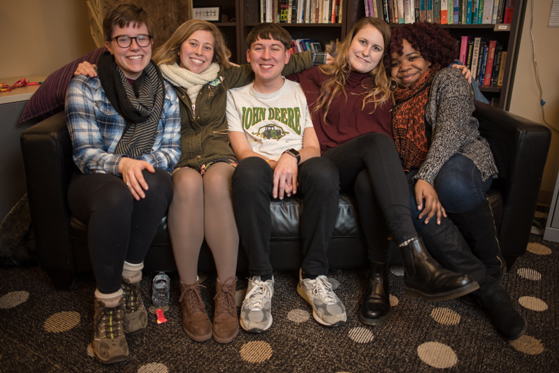 Students sitting on a couch.