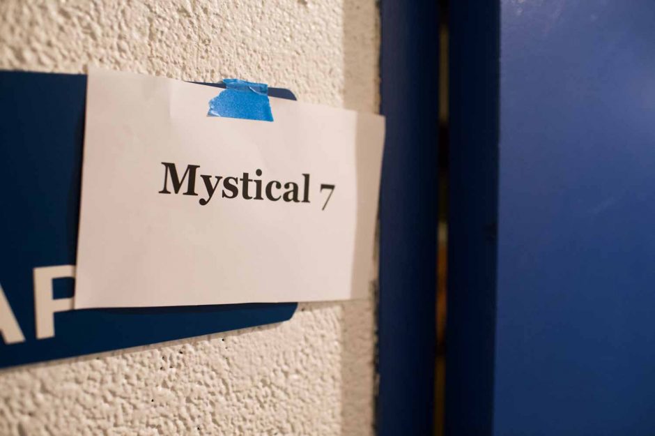 The members of Mystical Seven await their public reveal in the basement of Jesse Hall.