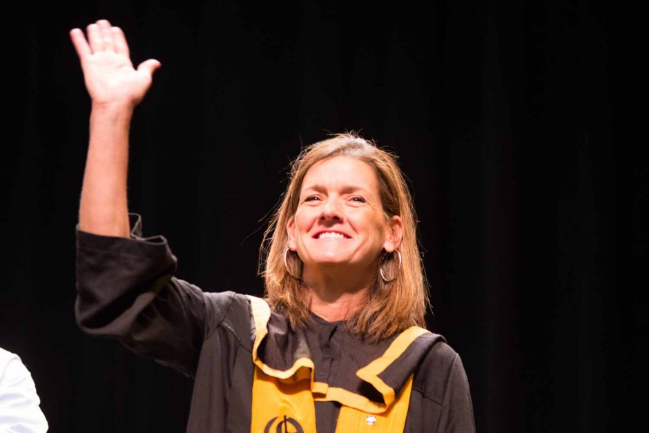 Robin Pingeton, head coach for Mizzou women's basketball, waves to the crowd after getting tapped by QEBH. Pingeton is entering her seventh season at the helm after the Tigers completed the best campaign during her tenure in 2016-17, winning 22 games.