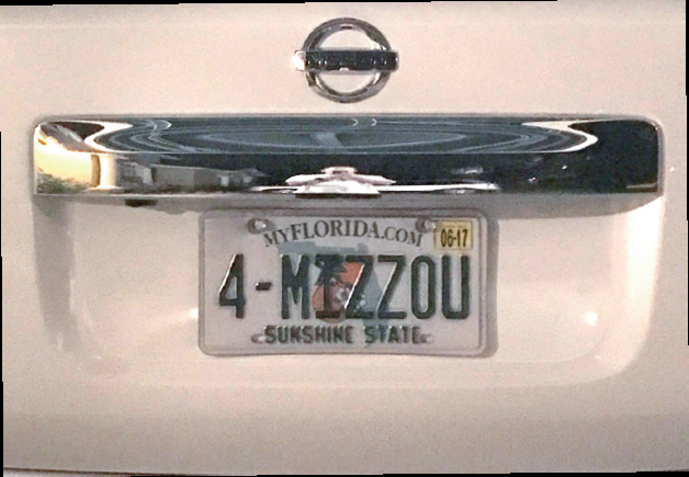Florida license plat that says "4-mizzou"