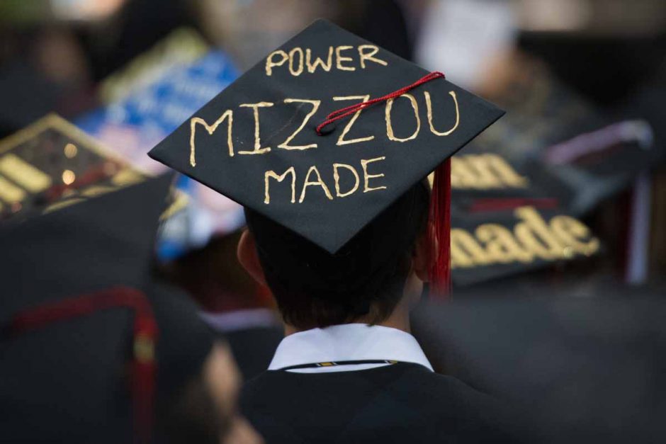Student wearing cap that says "Power MIZZOU Made"