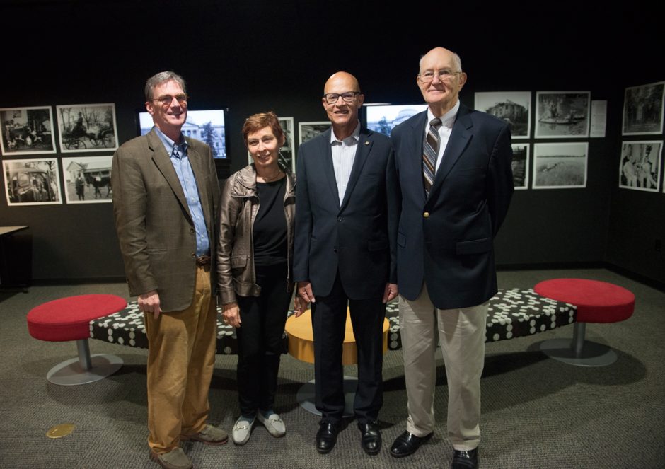 Berkley Hudson, Anita Stephens, Mike Middleton and Jim Turner in the center of the photo exhibit
