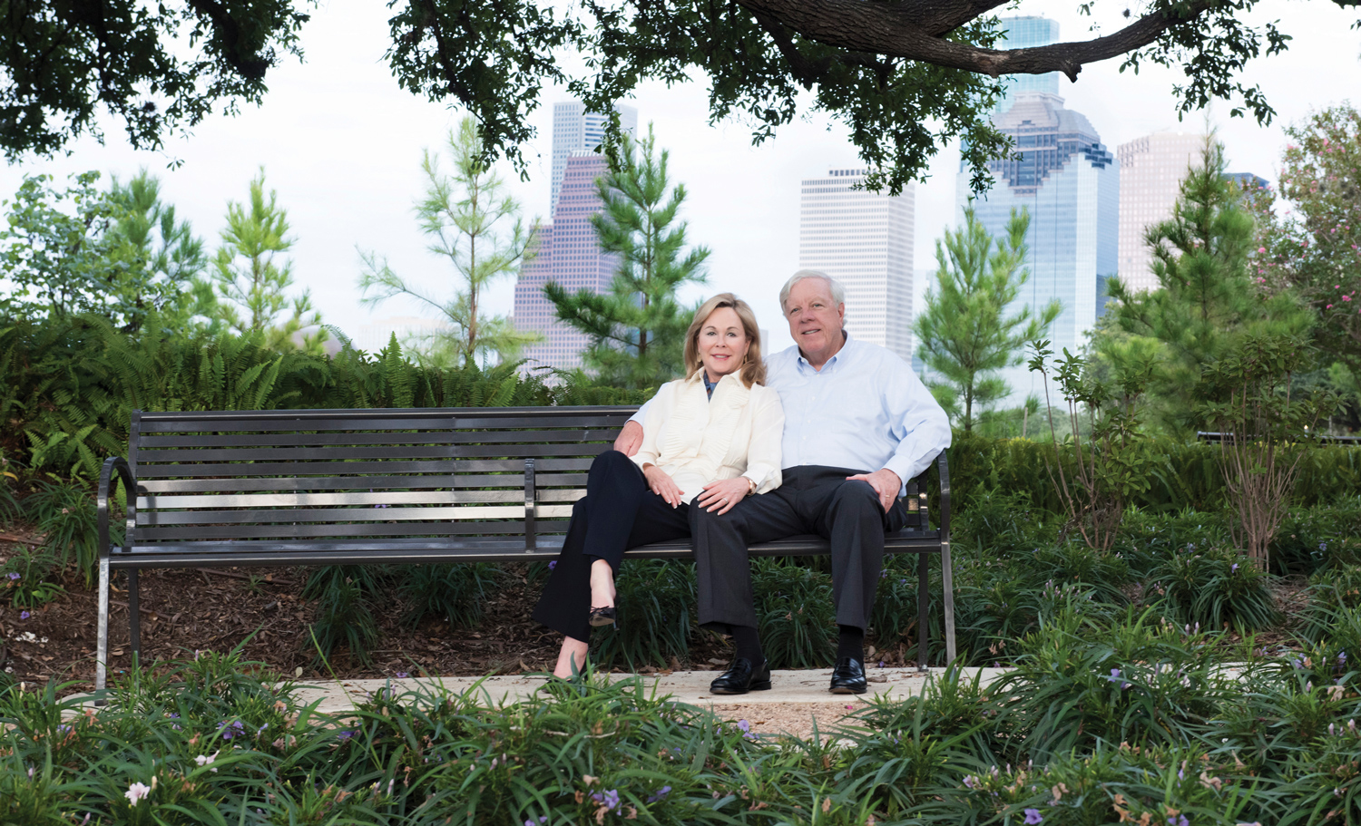 Rich and Nancy Kinder sitting on bench