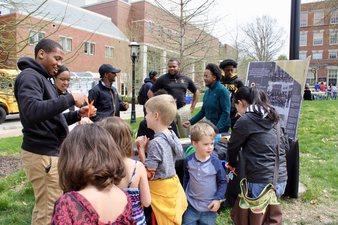 Members of the National Society of Black Engineers showed students how to build paper helicopters as part of the College’s STEM Cubs Festival on Show Me Mizzou Day.