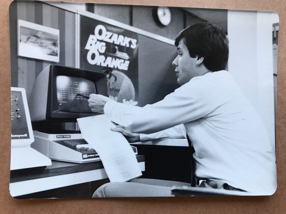 Don Meyer is pictured working at a computer in the 1970s. 