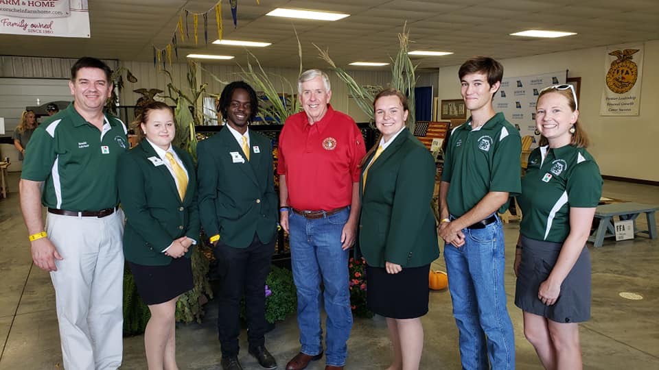 Snow works with her executive board to promote Missouri 4-H to state leaders, including Missouri Governor Mike Parson. 