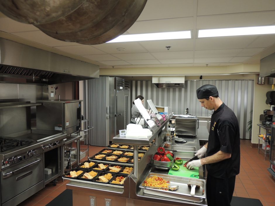 This is a photo of a research chef preparing meals.
